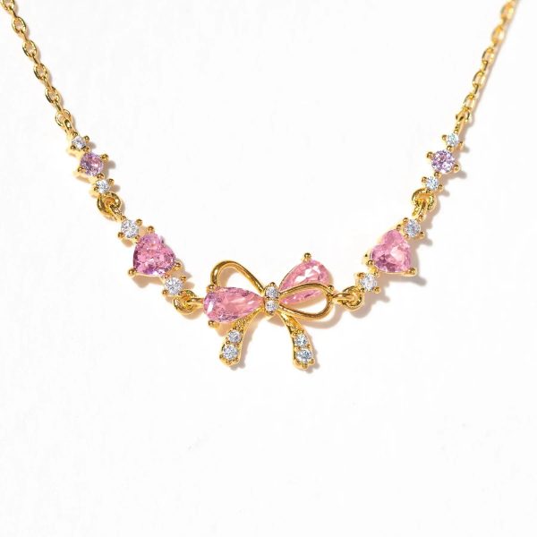 Hearty Pink & Gold Bow Bracelet